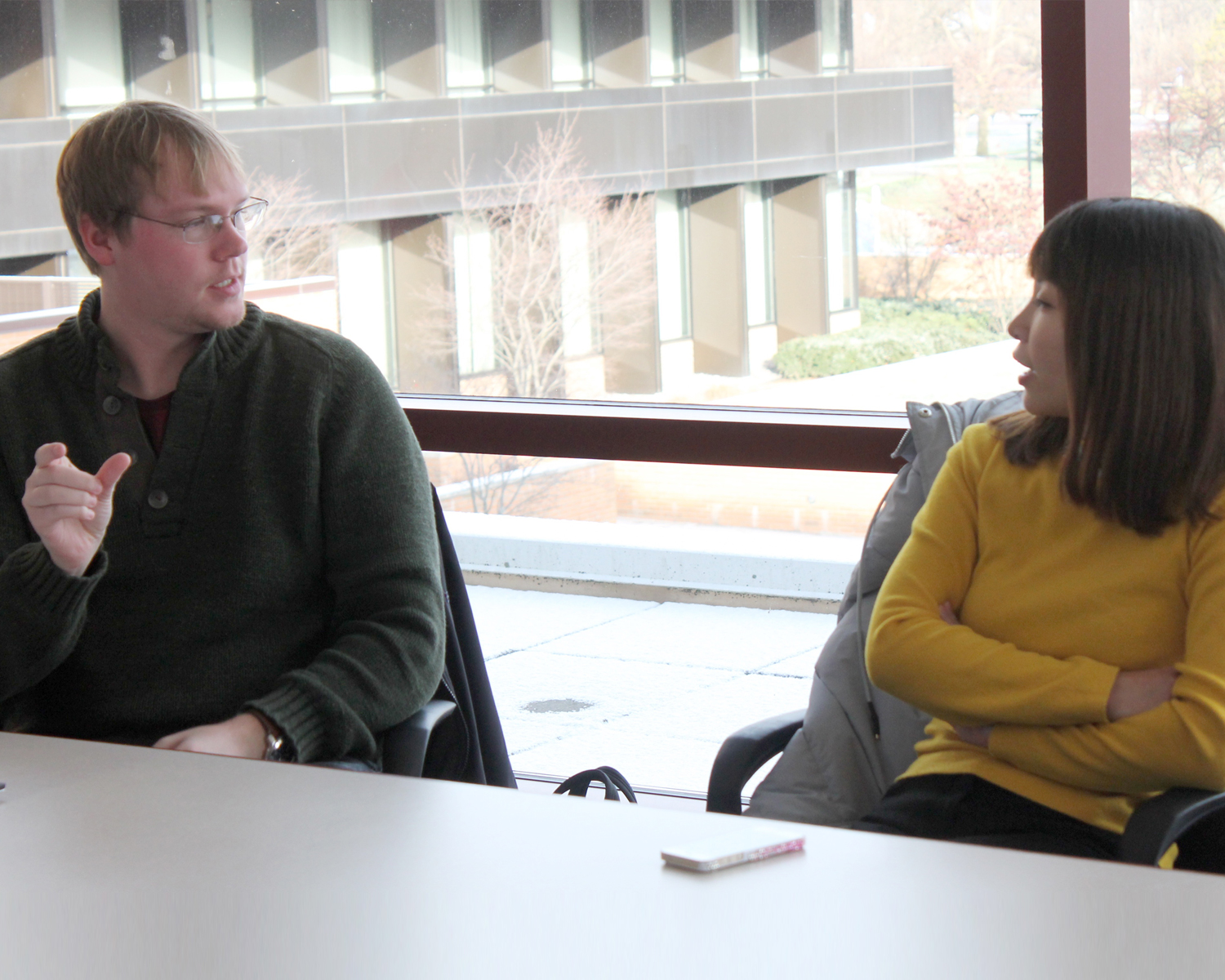 photograph of student meeting with client