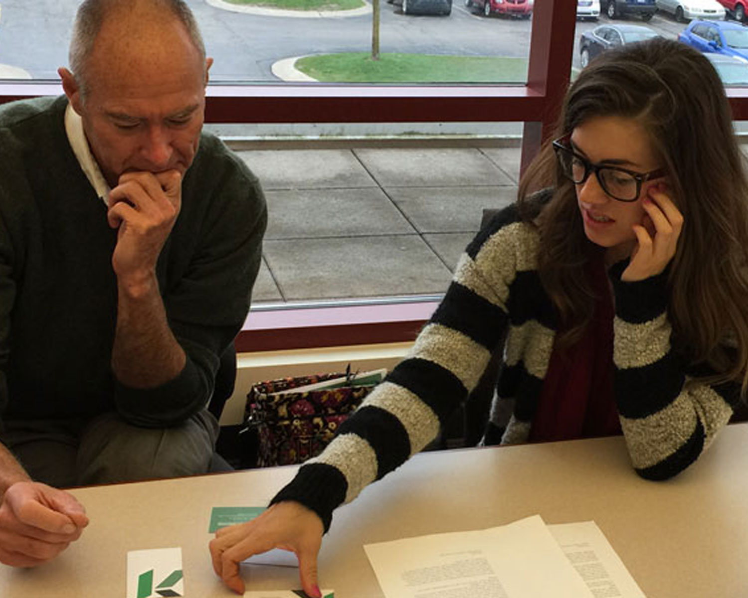 Photo of student presenting to client
