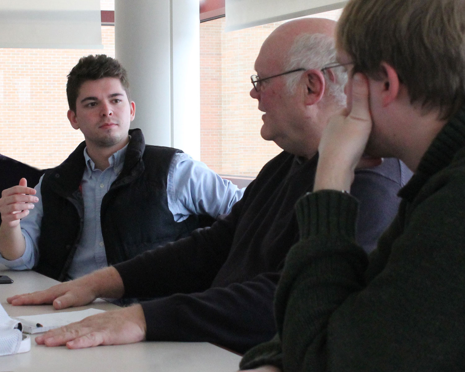 Photo of student presenting to client